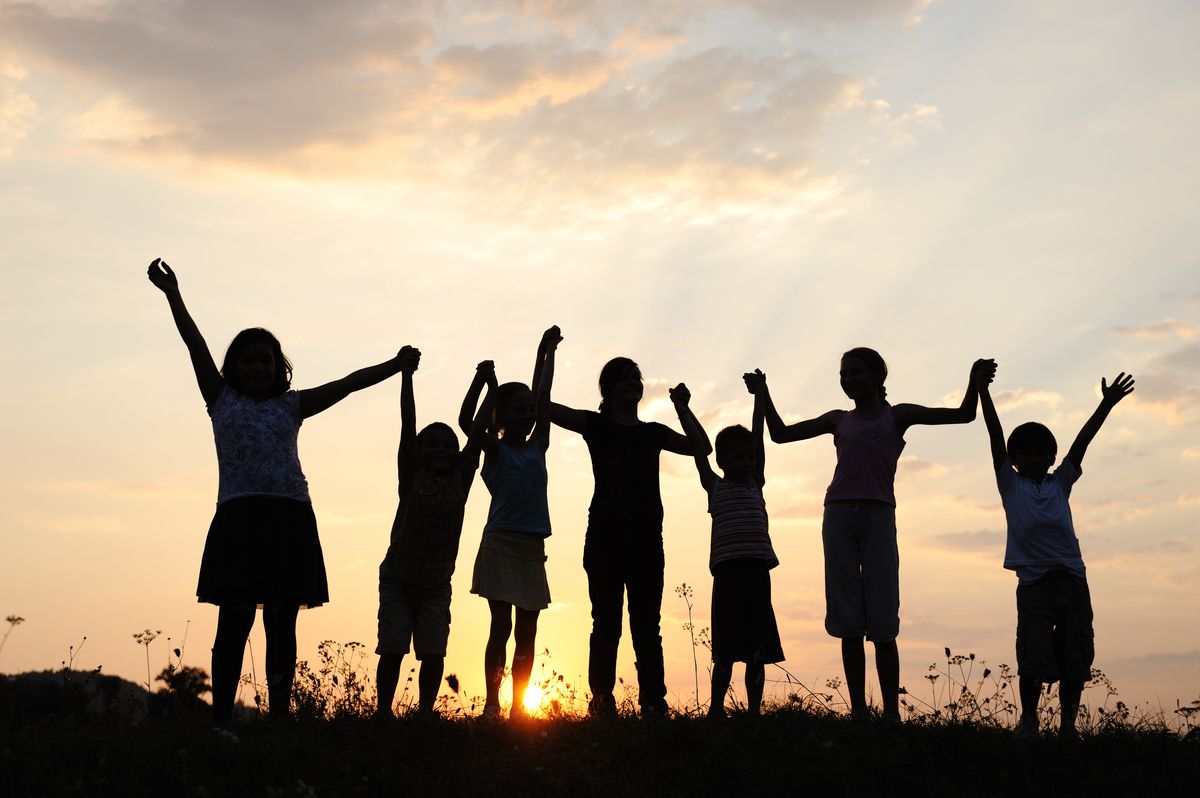 Image of silhoutted children child