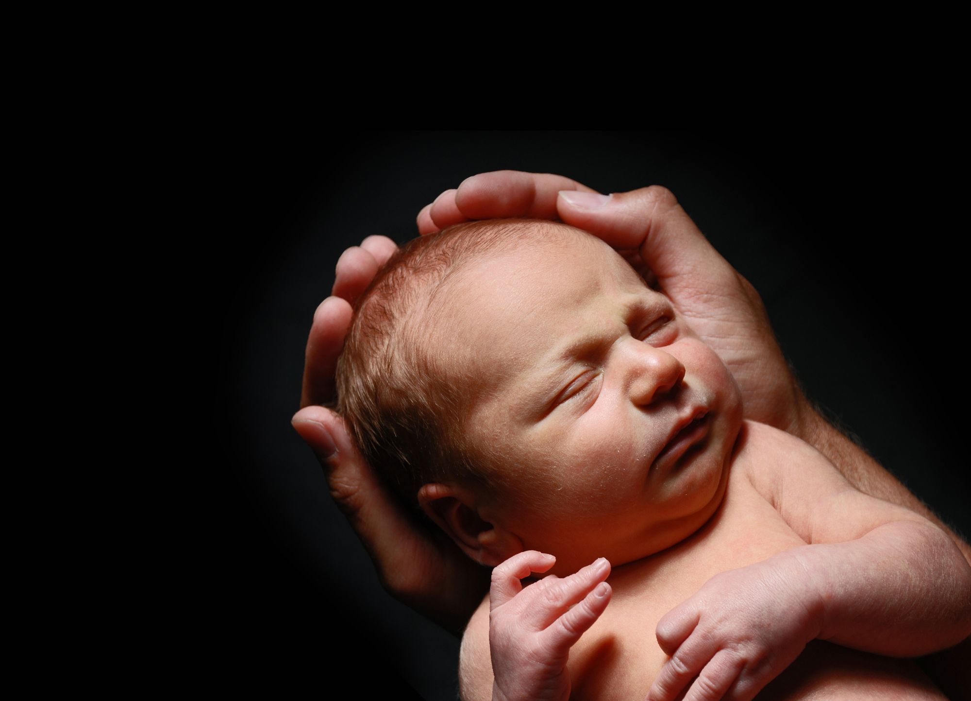 Person Holding Infant