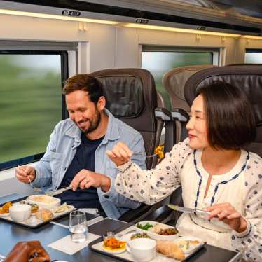 Passengers enjoy a meal in Eurostar Premier