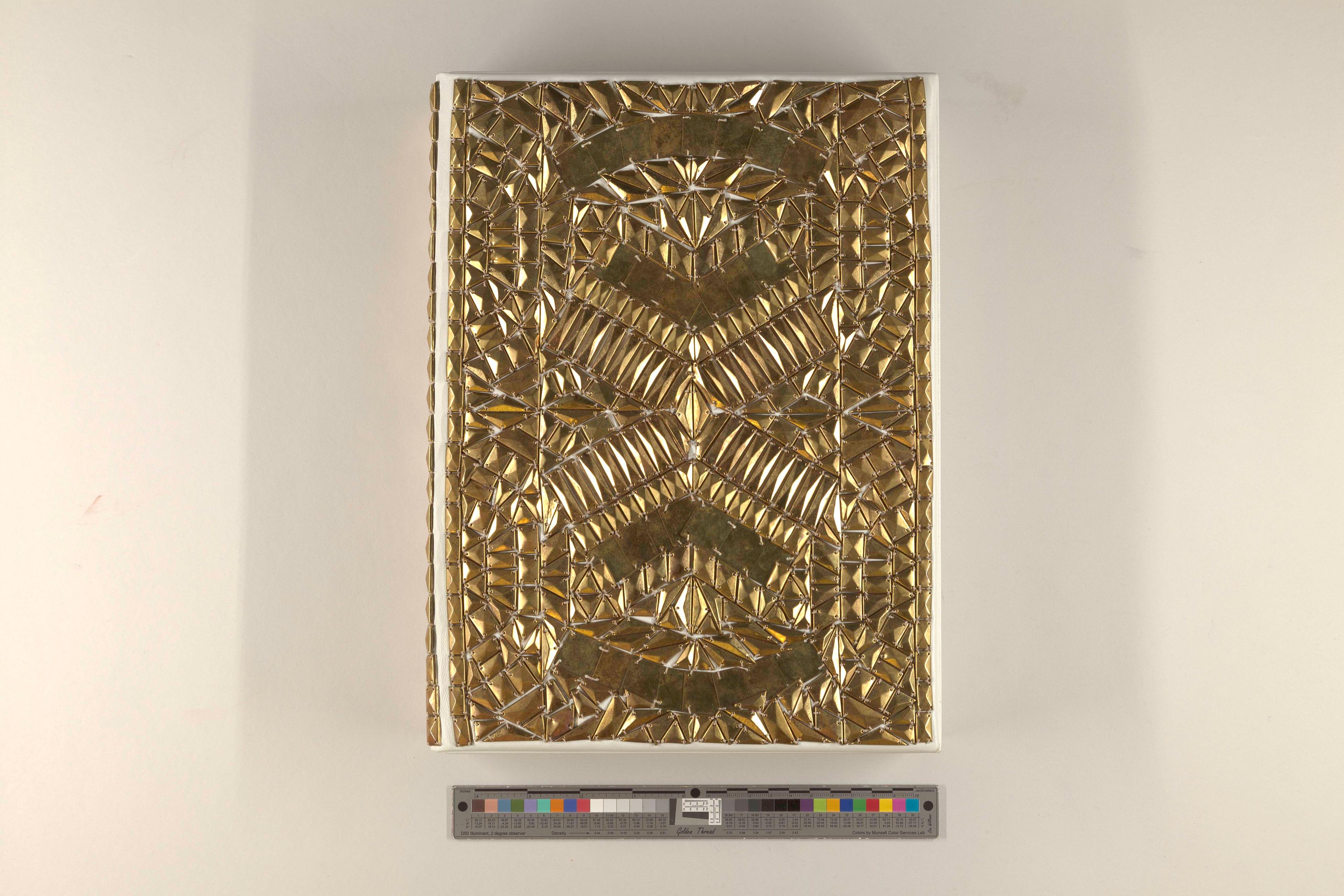 Gold, patterned cover